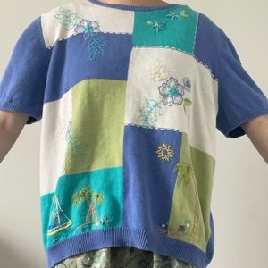 Cute patchwork sweater like material. Oversized. Embroidery on the patches